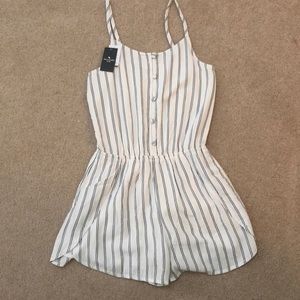 A&Fkids-romper, never worn. adjustable straps.